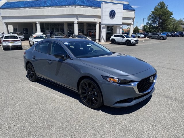 2026 Mazda Mazda3 Sedan 2.5 S Carbon Edition in Polymetal Gray Metallic — front three-quarter view