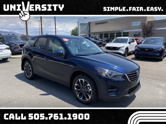 2016 Mazda Mazda CX-5 Grand Touring in Deep Crystal Blue Mica — front three-quarter view