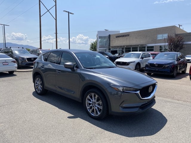 2021 Mazda Mazda CX-5 Grand Touring Reserve in Machine Gray Metallic — front three-quarter view